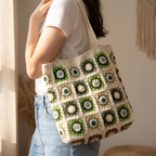 Ivory crochet green daisy granny square tote bag - carried over the shoulder