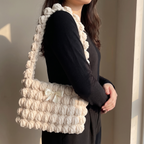 Ivory chenille bobble shoulder bag - carried over the shoulder